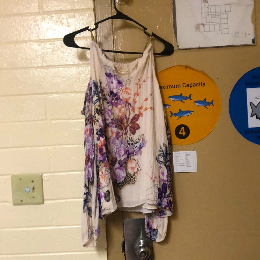 This was made in Indonesia and is such a comfortable fabric that has gold chains